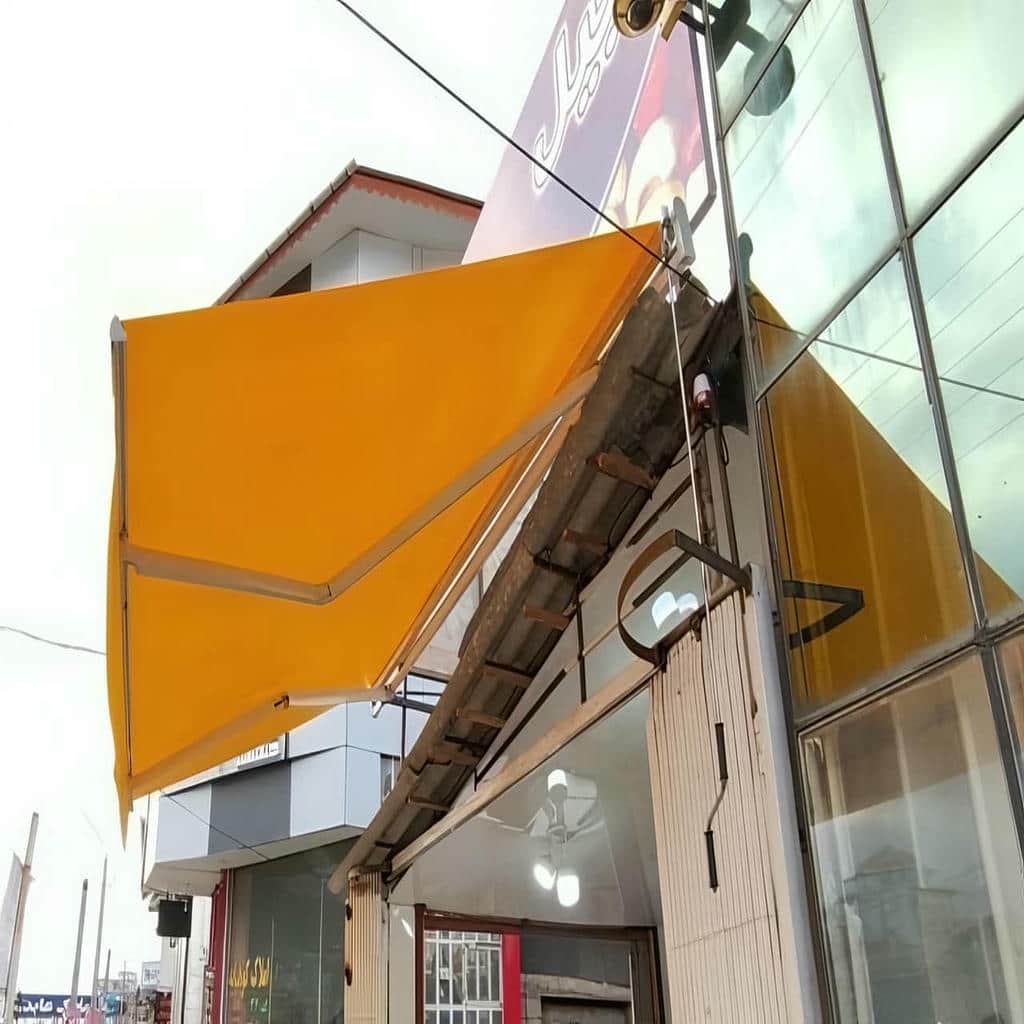 سایبان برقی در رشت نصب روی نمای مغازه