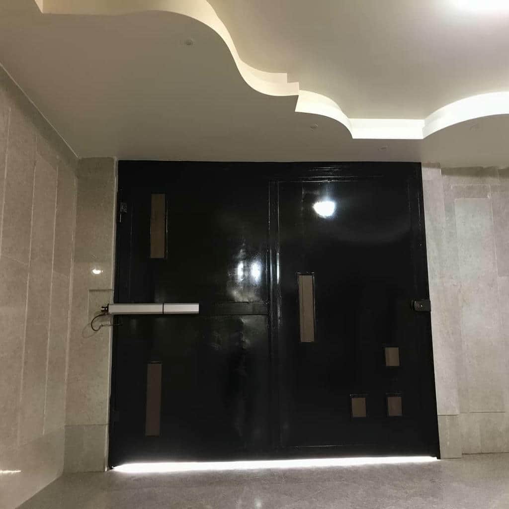 قیمت جک درب پارکینگ در رشت با قفل برقی و یراق تقویت شده