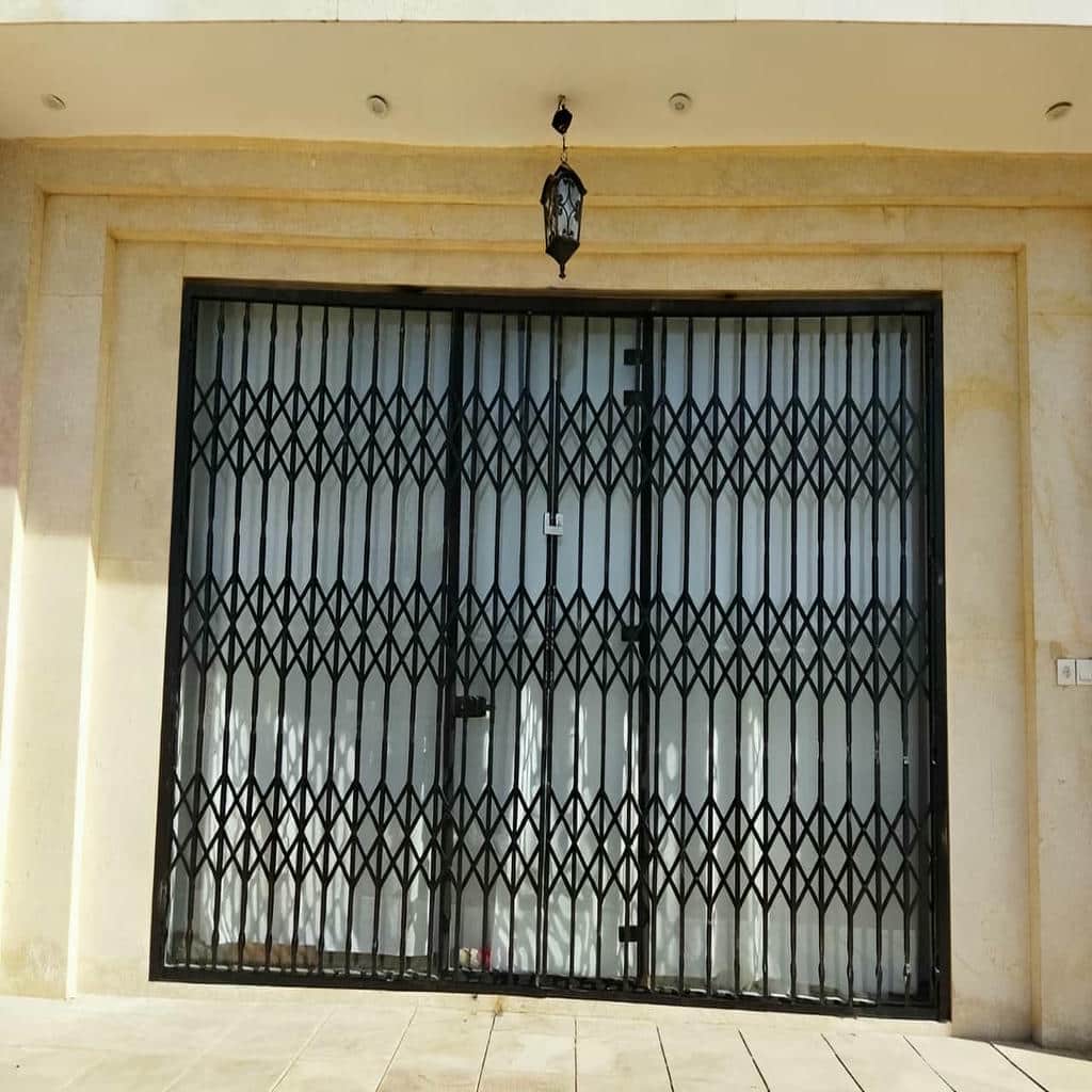 درب آکاردئونی طرح دار لوزی با شبکه درشت در رشت درب آکاردئونی طرح دار لوزی با شبکه درشت در رشت
