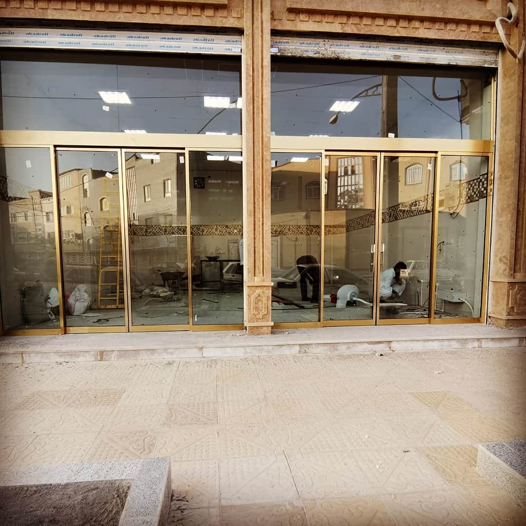 خرید درب اتوماتیک شیشه ای پرتردد مجتمع تجاری در رشت