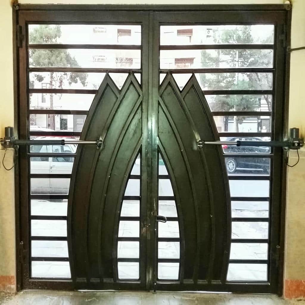 خرید درب برقی پارکینگ ریلی متناسب با وزن لنگه در رشت