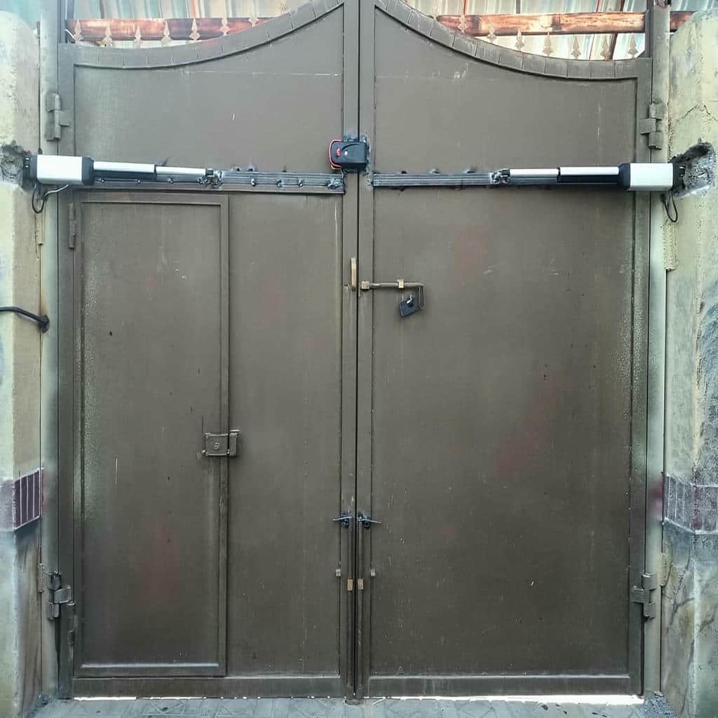 خرید جک درب پارکینگ ایرانی بازویی برای ساختمان در رشت